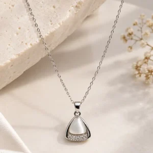 Ivory Glow silver-tone triangle pendant necklace with milky white centre and clear crystal detailing