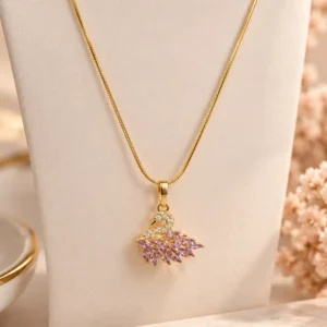 Gold-tone swan pendant necklace with blush pink marquise stones and clear accents by Orika Jewels