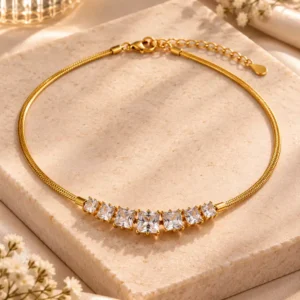 Gold-tone crystal necklace for women with seven graduated square-cut clear stones and adjustable chain