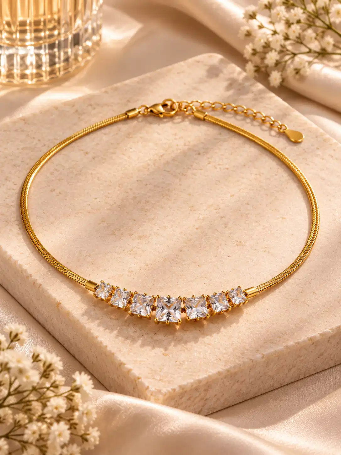 Gold-tone crystal necklace for women with seven graduated square-cut clear stones and adjustable chain