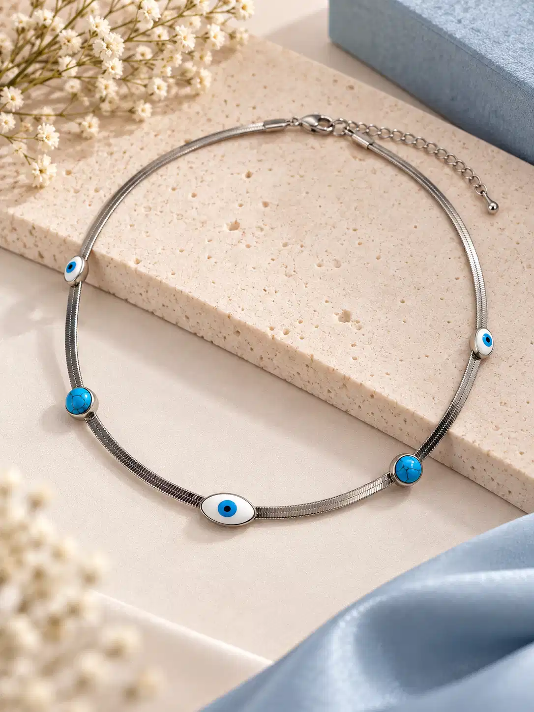 Adjustable silver nazar necklace with turquoise accents, lobster clasp and extension chain