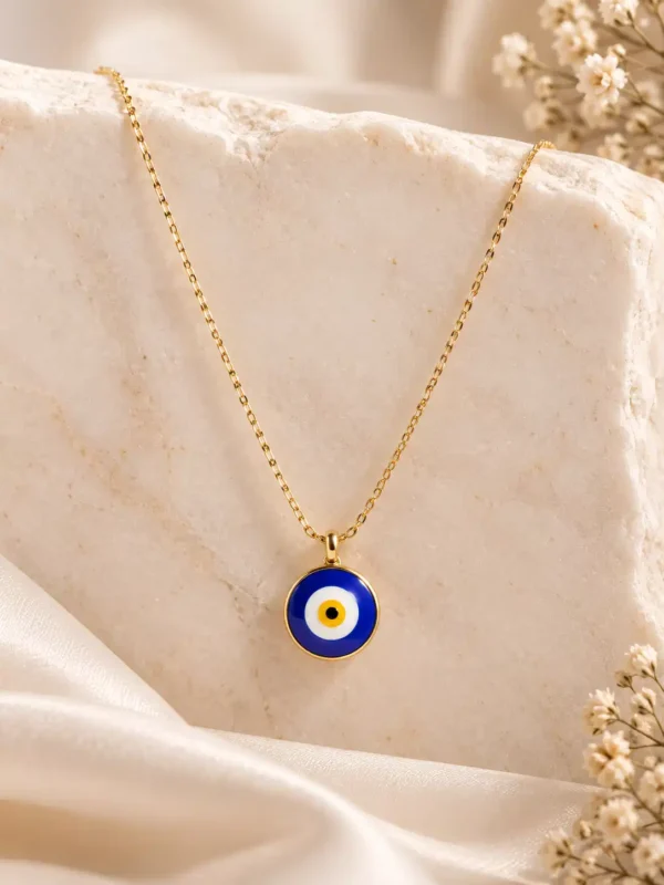 Nazar Muse gold-tone evil eye necklace for women with round cobalt blue nazar pendant by Orika Jewels