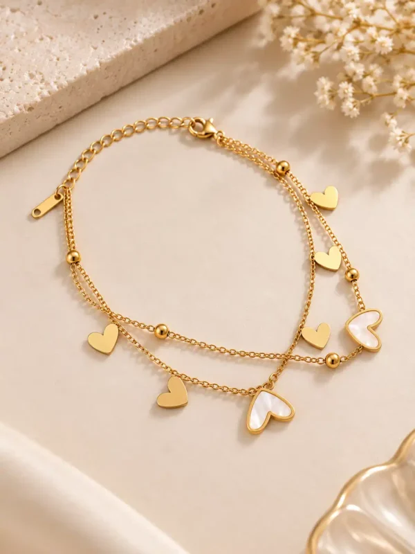 Double layer gold heart bracelet for women with ivory heart charms and adjustable chain