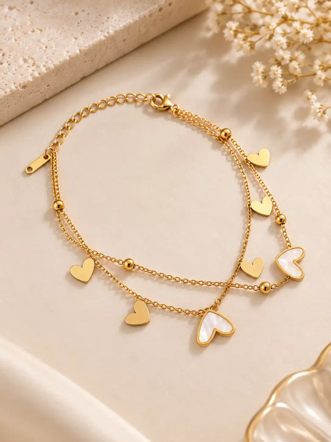Double layer gold heart bracelet for women with ivory heart charms and adjustable chain